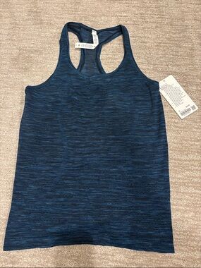 NWT Lululemon swiftly tech racer back 2.0. Size 10 blue and black patterned.
